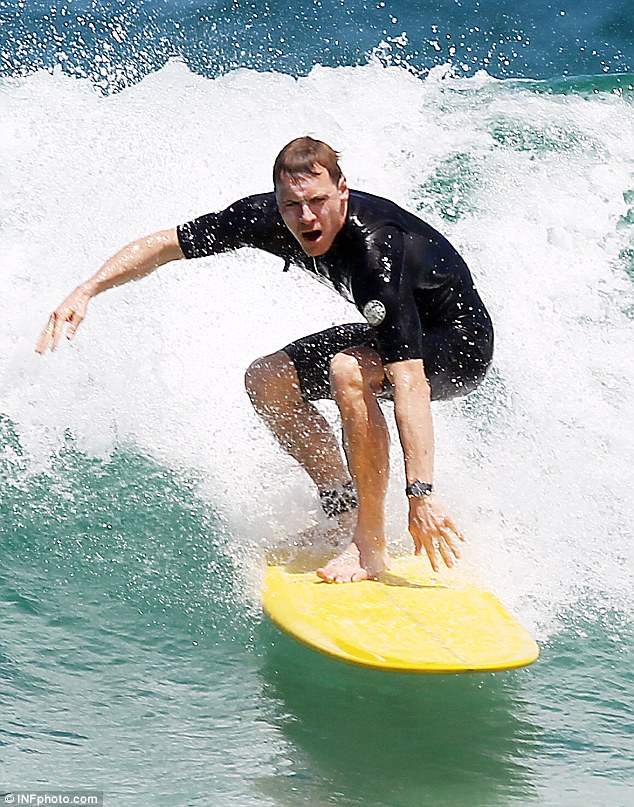 Michael Fassbender surfing